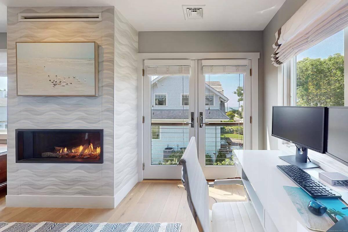 Home Office with Scenic Views and Modern Fireplace