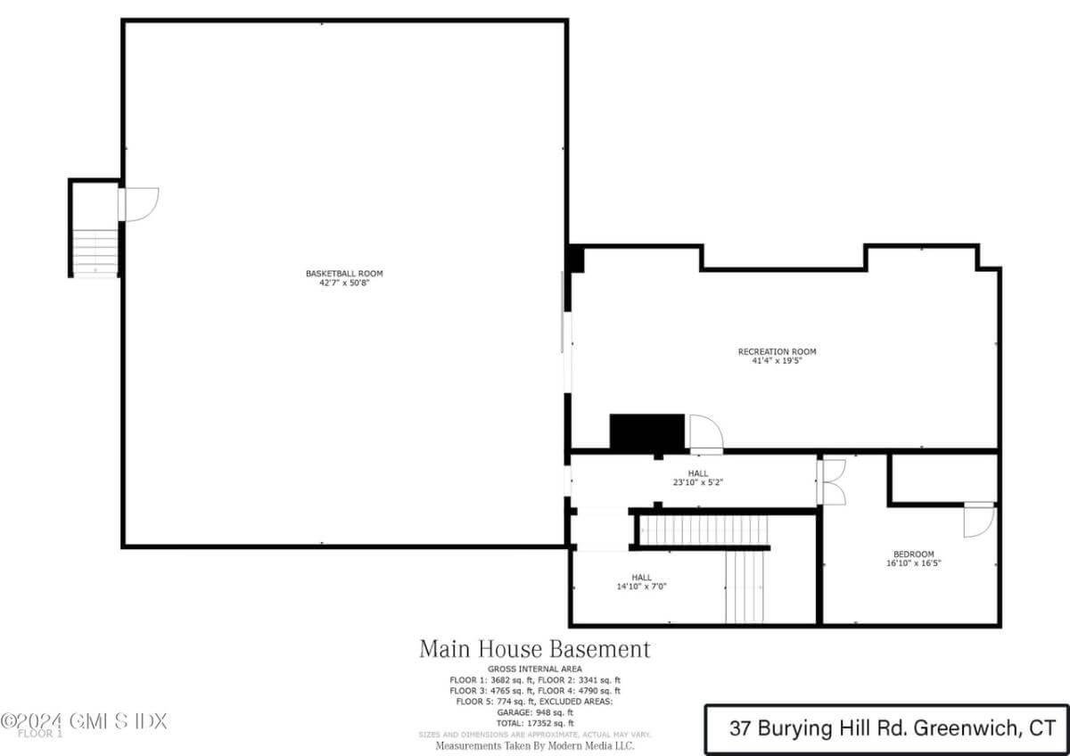 Explore the Expansive Basement with its Own Basketball Court