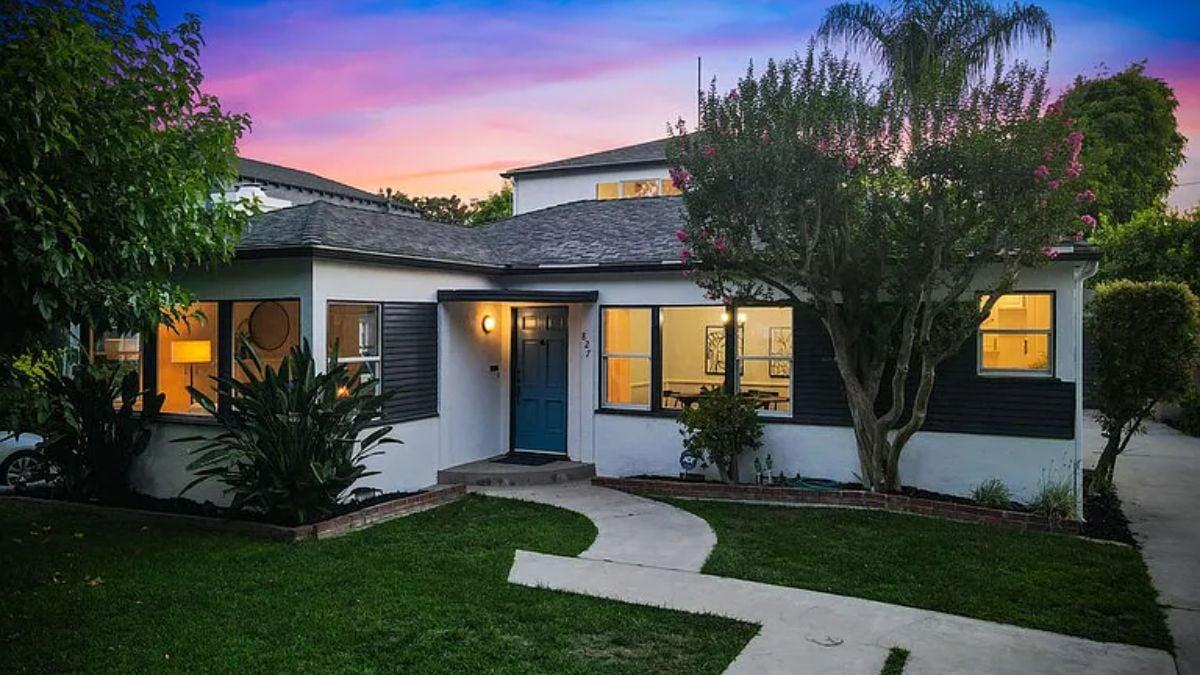 Charming Front Yard with a Distinct Blue Door