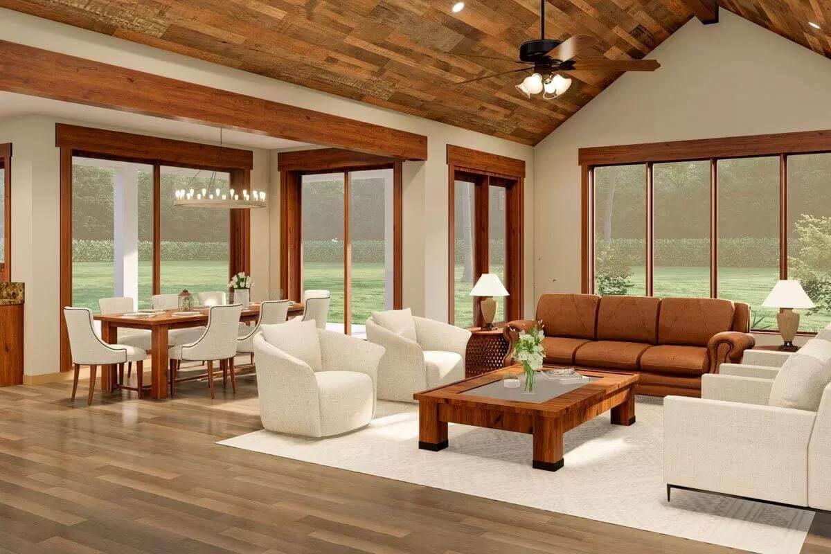 Explore a Living Area Defined by Bold Beamed Ceilings and Expansive Windows