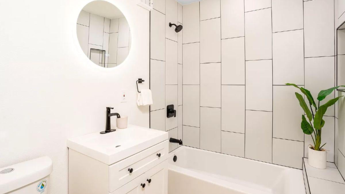 Minimalist Bathroom with Chic Black Fixtures
