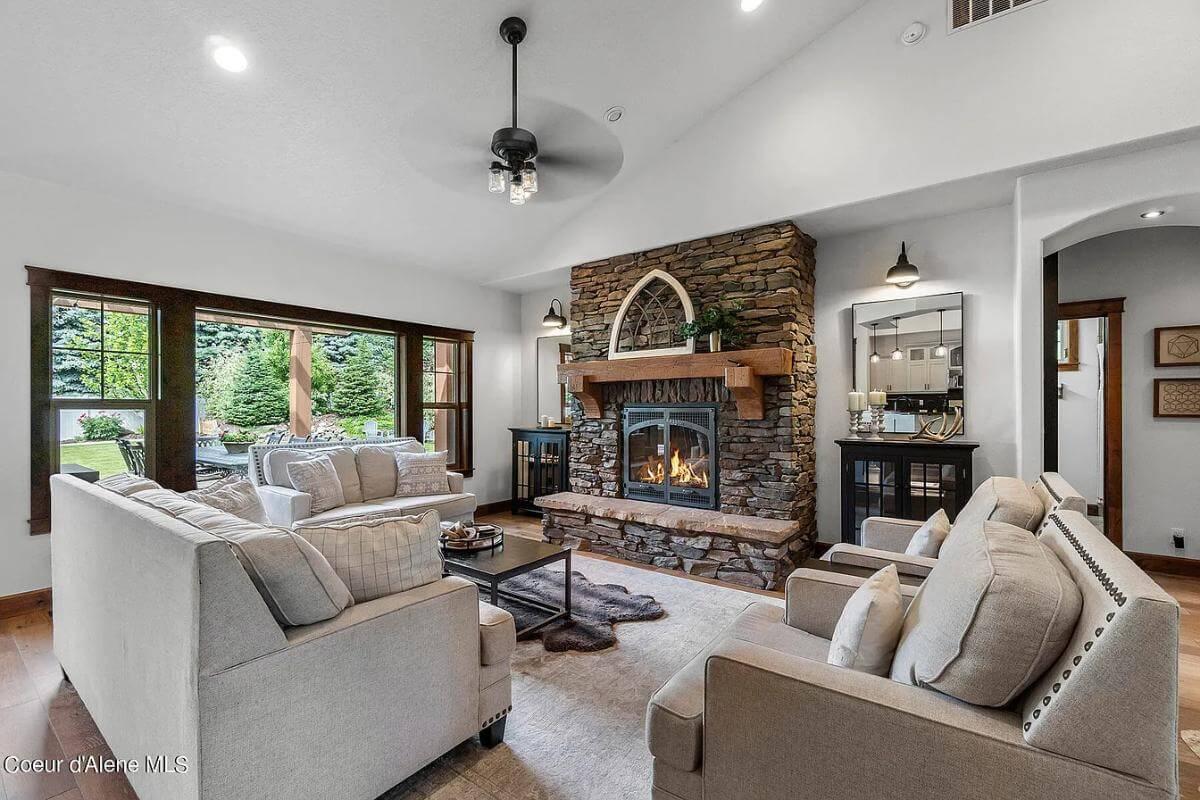Cozy Living Room with Striking Stone Fireplace