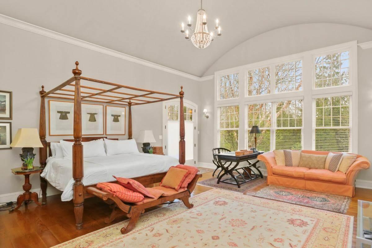 Check Out the Elegant Four-Poster Bed in This Sunlit Bedroom