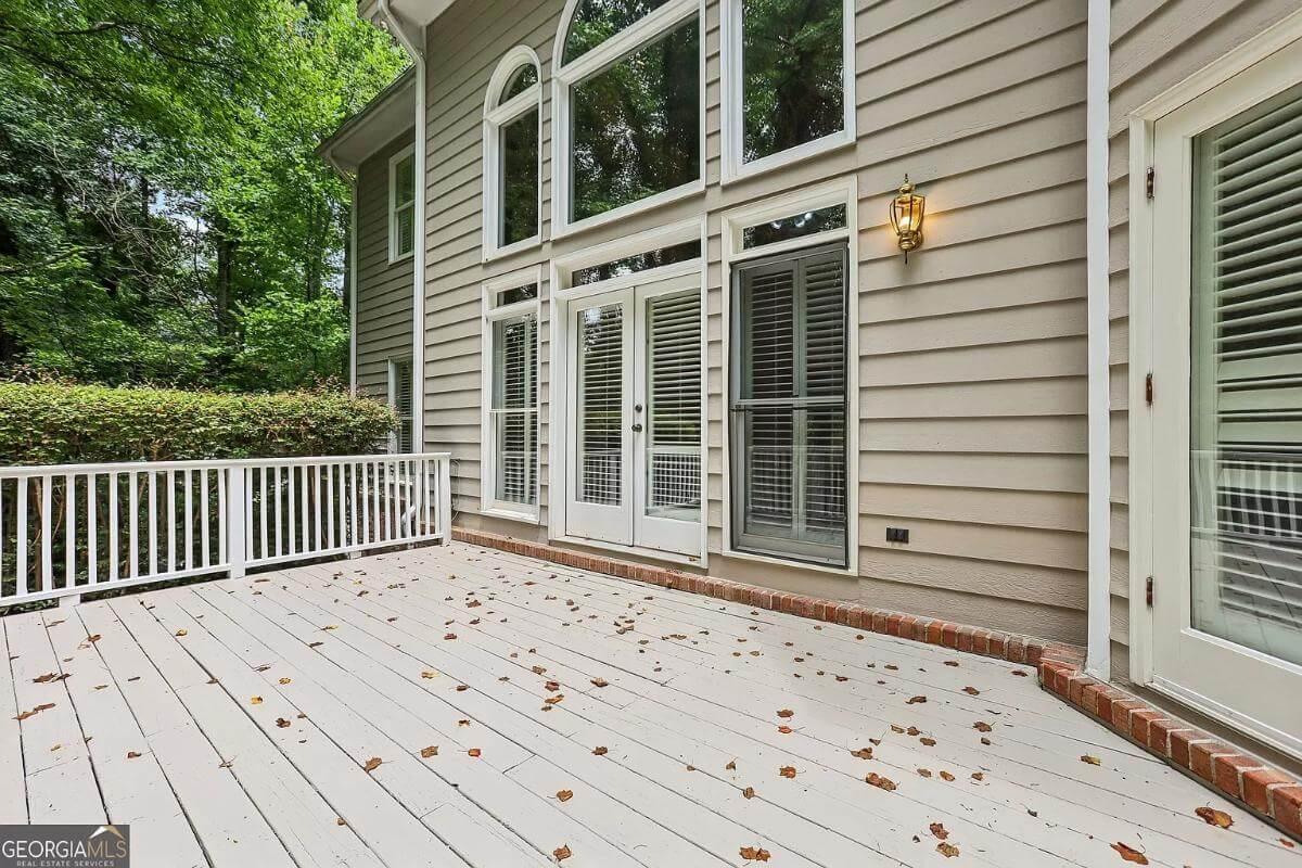 Expansive Deck with Wooded Views and French Doors