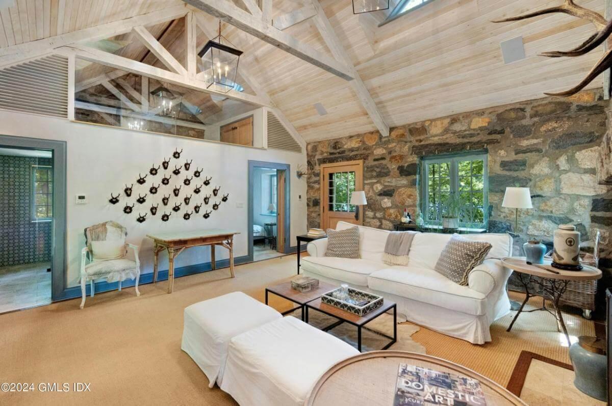 Look at the Rustic Stone Walls in This Charming Living Room