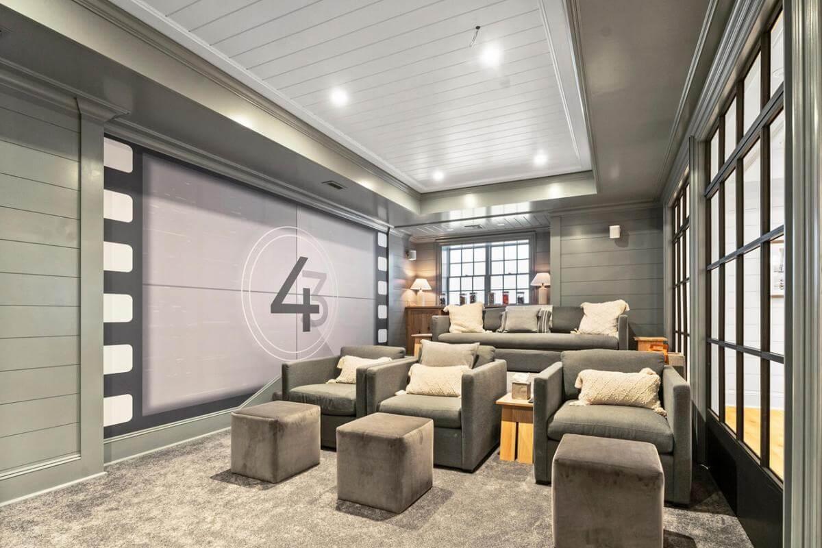 Dive into this Craftsman Home Theater with Comfortable Seating