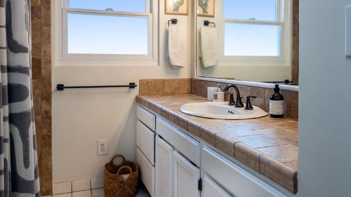 Tiled Countertop Adds Texture to a Bright Bathroom