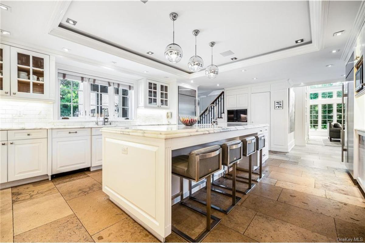 Check Out the Stunning Island in This Bright Kitchen