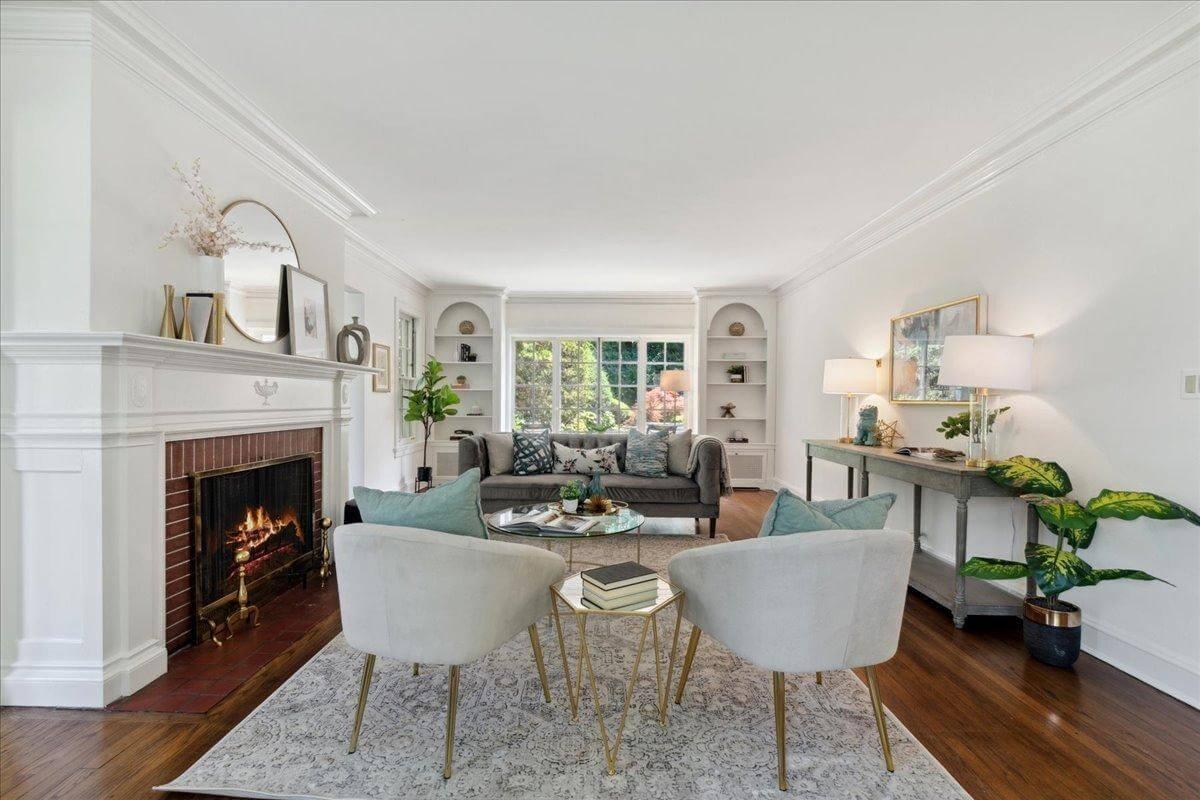Bright Living Room with Fireplace Warmth and Built-in Charm
