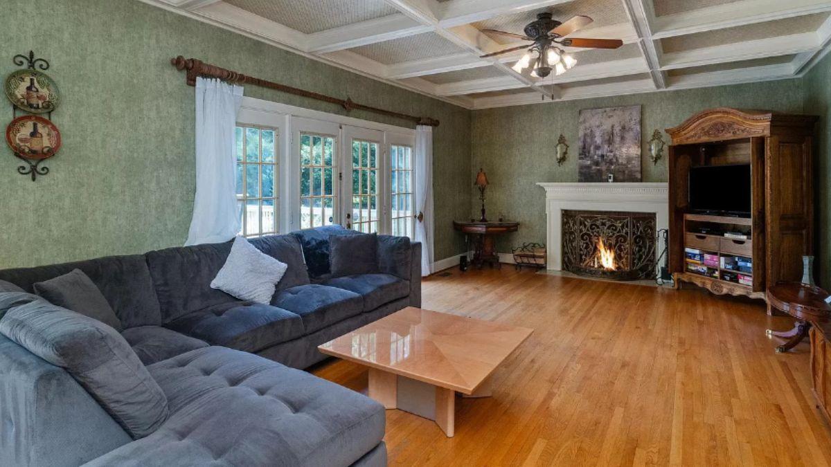 Relax in This Elegant Living Room with a Cozy Fireplace