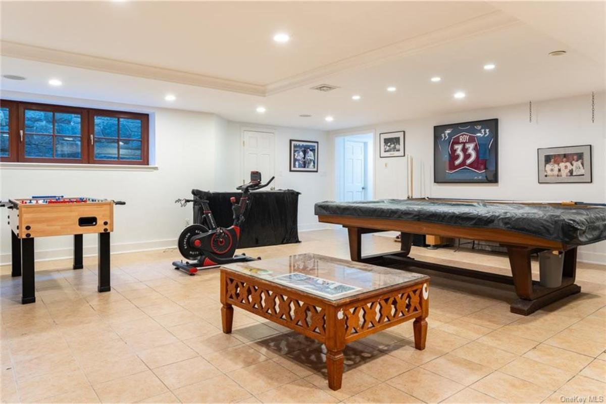 Step Into This Vibrant Game Room with a Classic Foosball Table