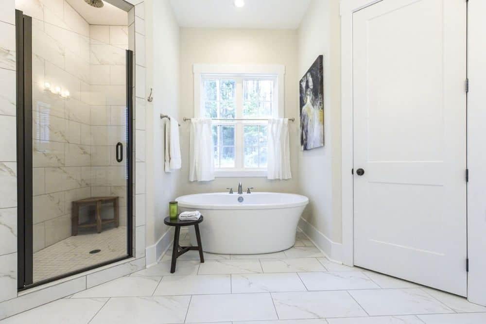 Notice the Sleek Freestanding Tub in This Craftsman Bathroom