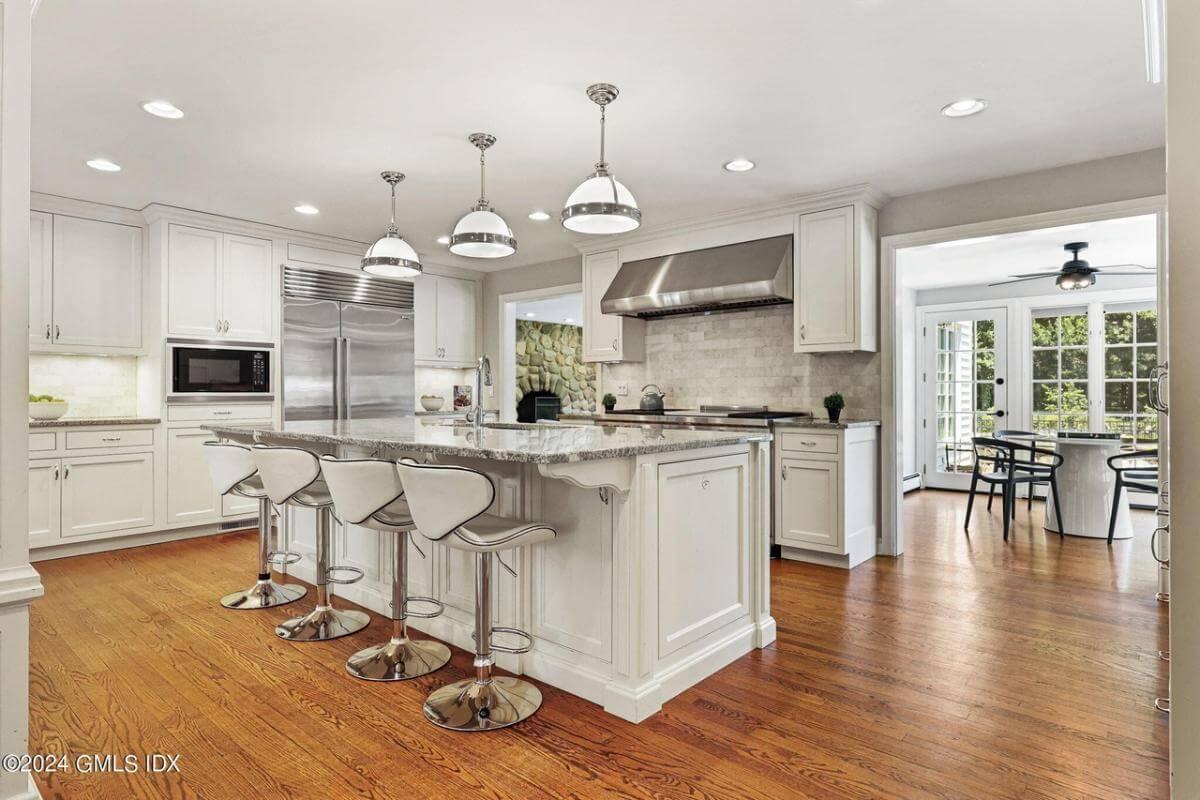 Admire the Granite Island Taking Center Stage in This Kitchen