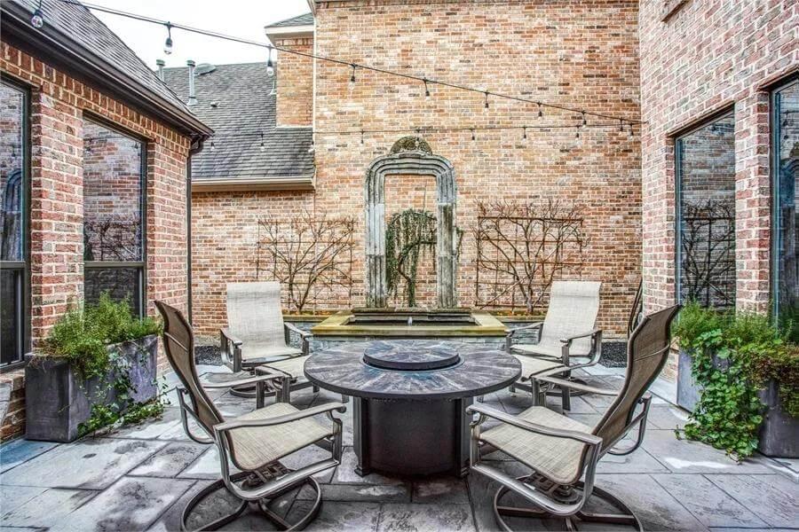 Explore This Tranquil Courtyard with a Central Water Feature