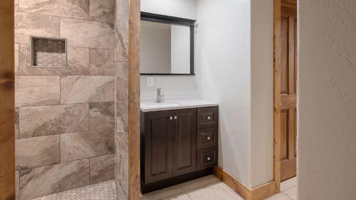 Look at the Hexagonal Tile Niche in This Rustic Bathroom