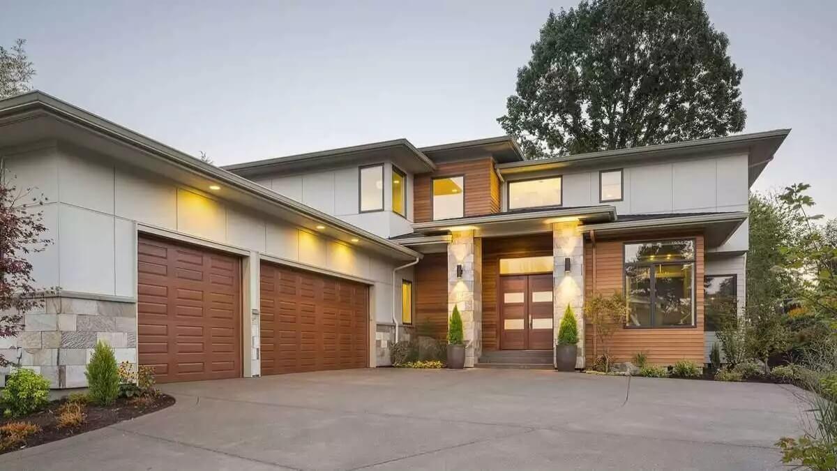 Modern Facade with Striking Wooden Accents and Stone Columns