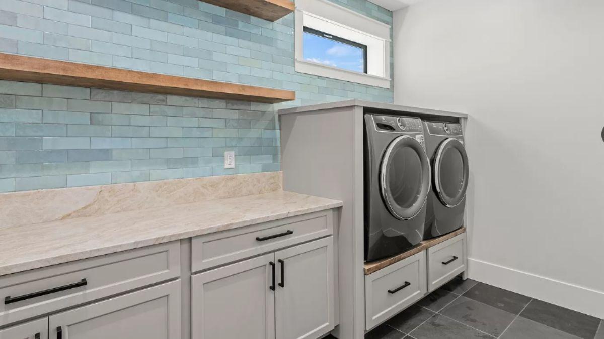 Spotlight on the Efficient Laundry Room with Sky-Blue Tile