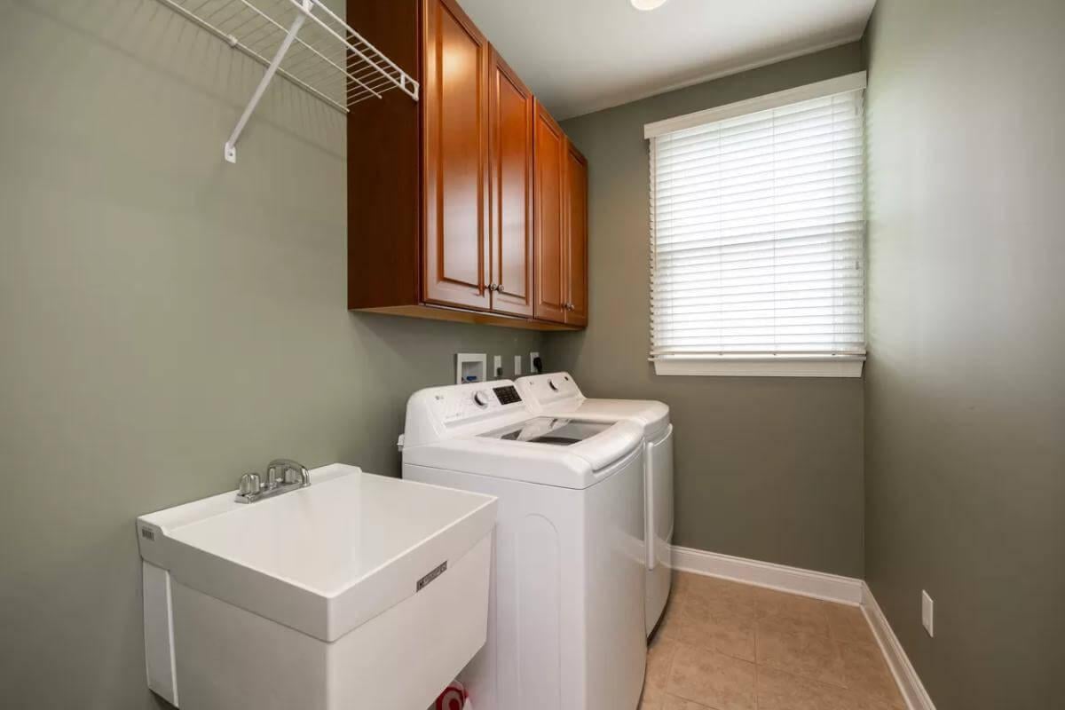 Functional Laundry Room with Handy Utility Sink