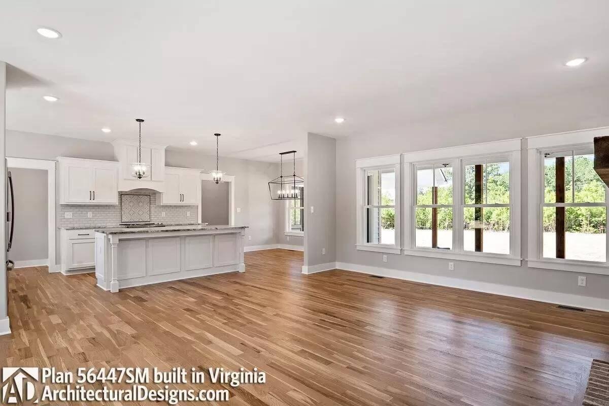 Spacious Kitchen with Large Island and Wooden Floors