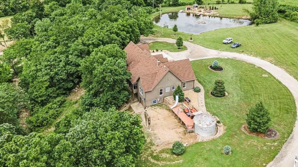 Aerial Perspective on Picturesque Rural Retreat with Private Pond