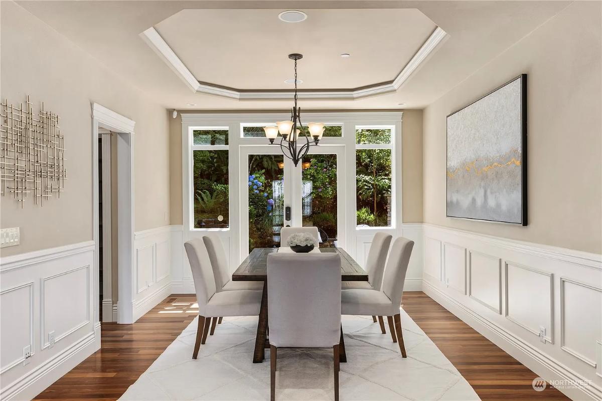 Elegant Dining Room with Octagonal Tray Ceiling and Garden Views