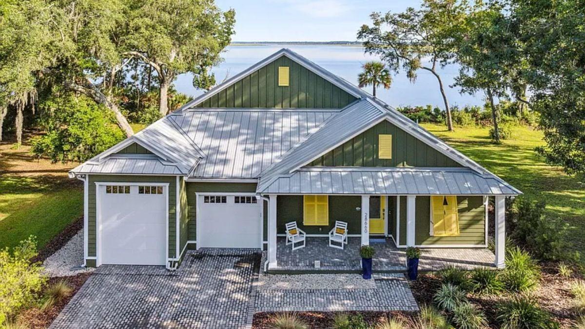 Charming Waterfront Retreat with Bright Yellow Shutters