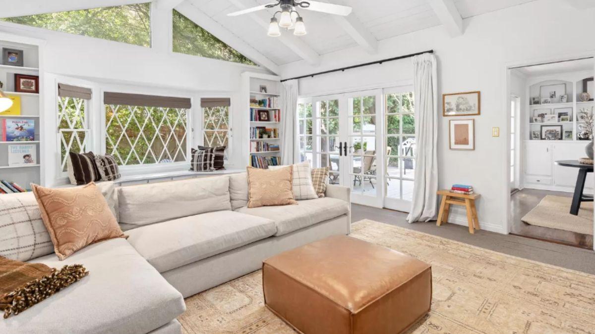 Bright Living Room with Charming Diamond-Paned Windows