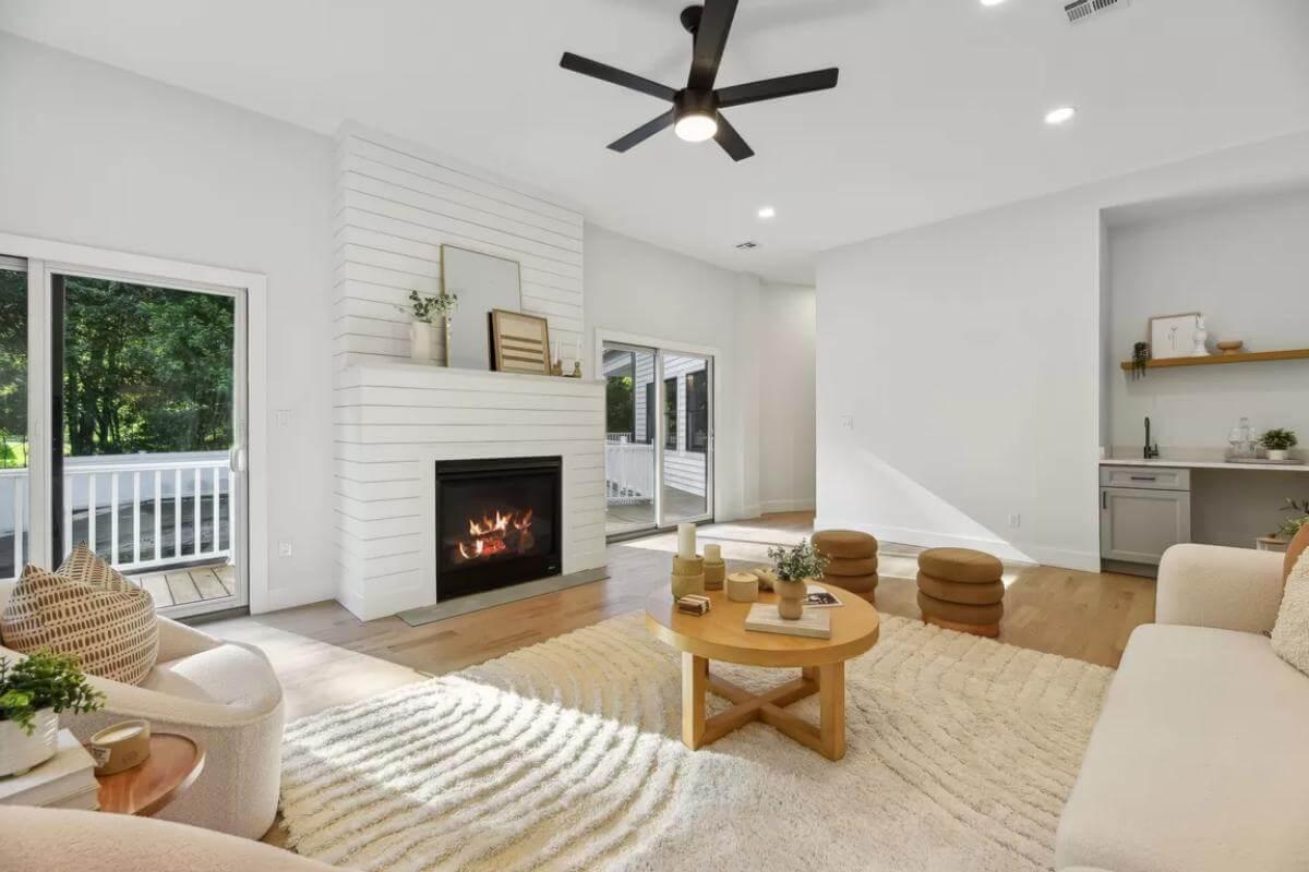 Cozy Living Room with Shiplap Fireplace and Natural Light