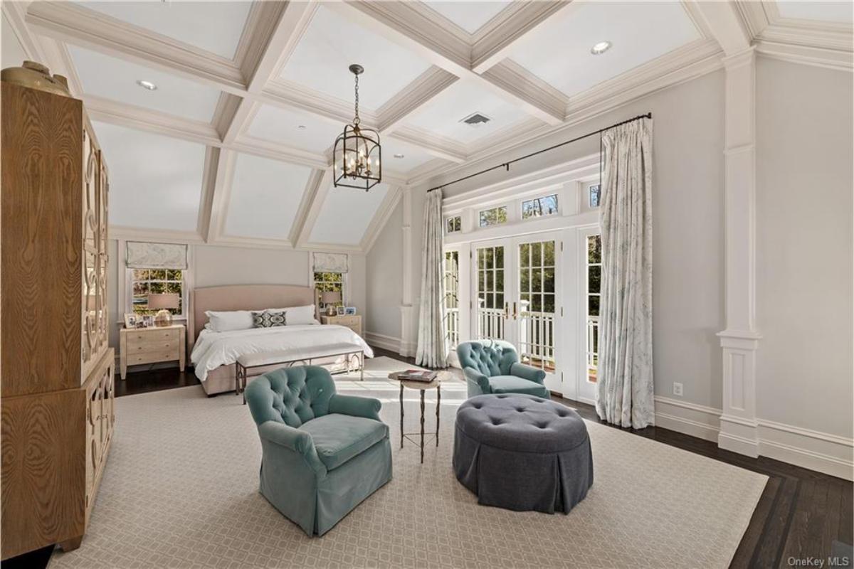 Notice the Vaulted Ceiling and Soft, Plush Seating in This Master Retreat