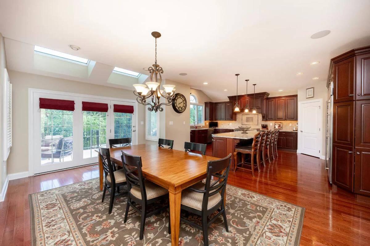 A Gathering Space: Notice the Skylights Enhancing the Open Dining and Kitchen Area