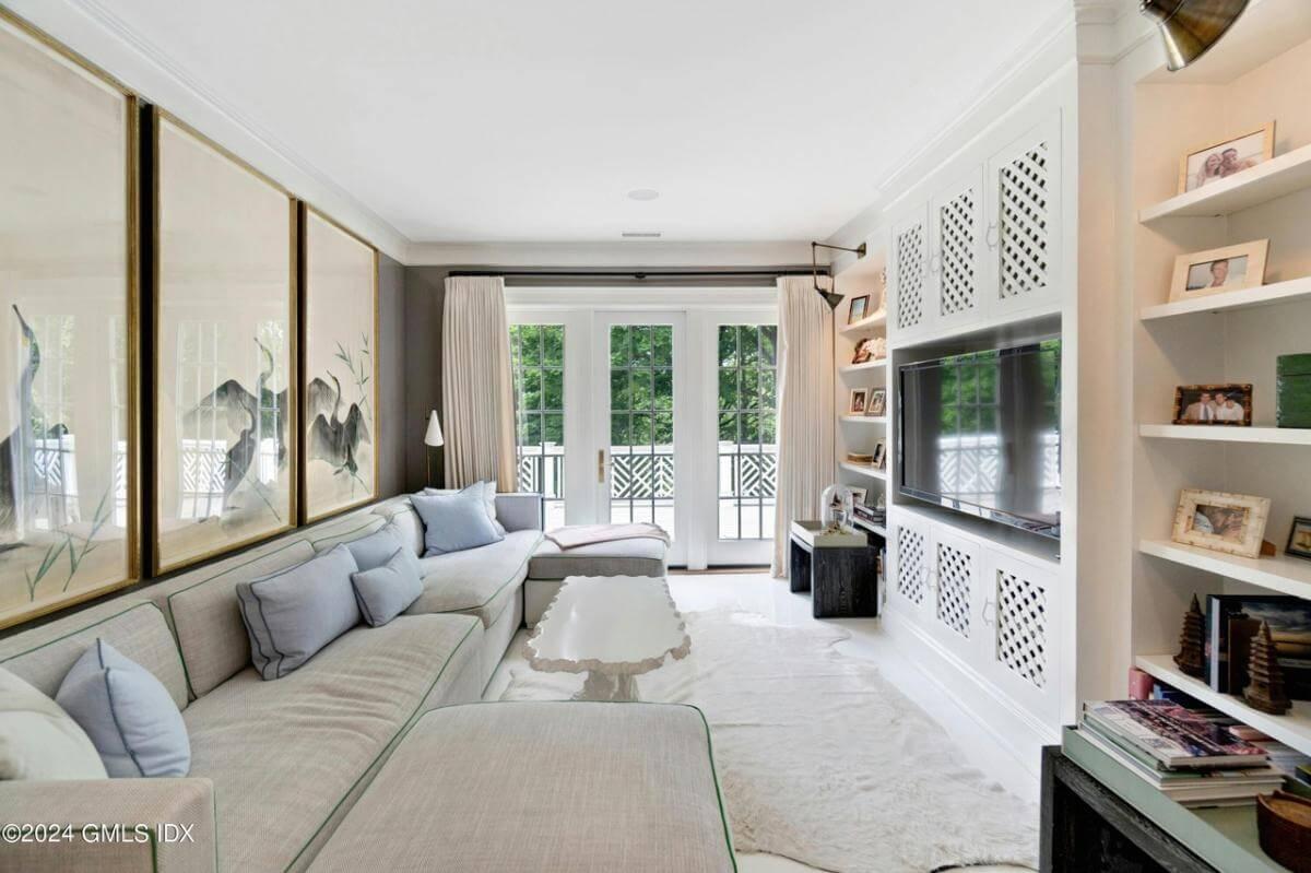 Relax in This Stylish Family Room with Elegant Screen Panels
