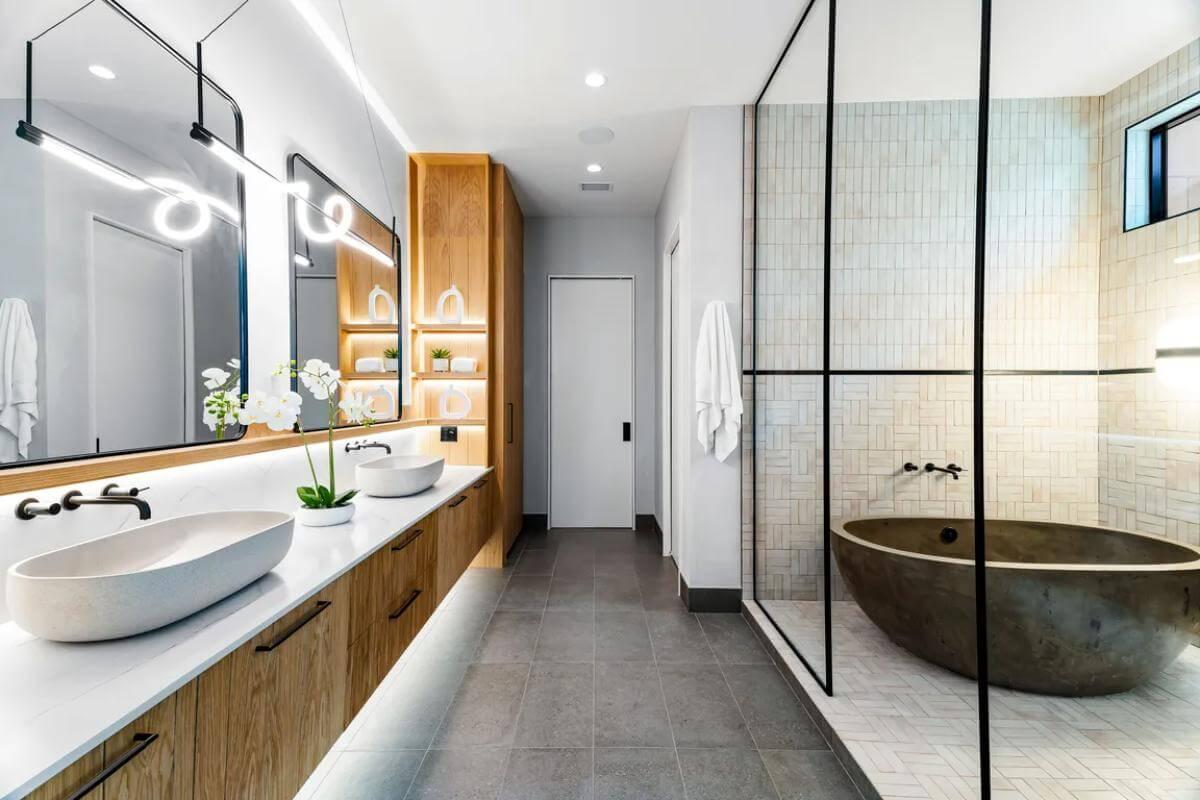 Check Out the Striking Stone Tub in This Sleek Bathroom