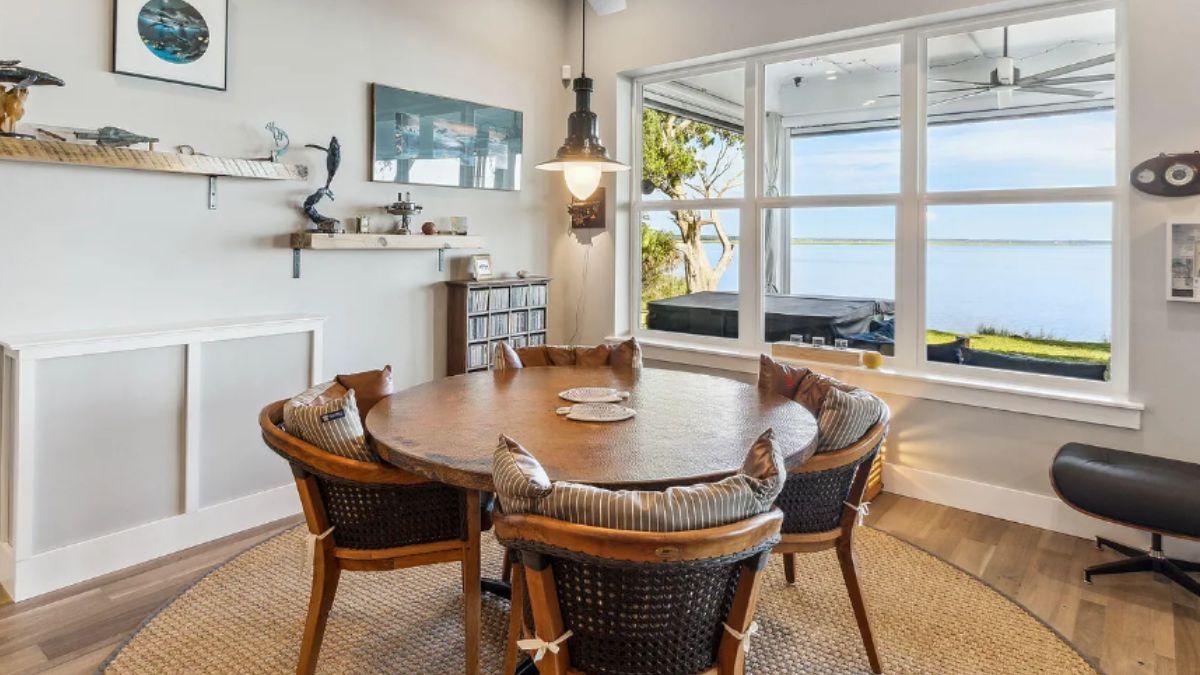 Unwind in This Dining Nook with Mesmerizing Water Views