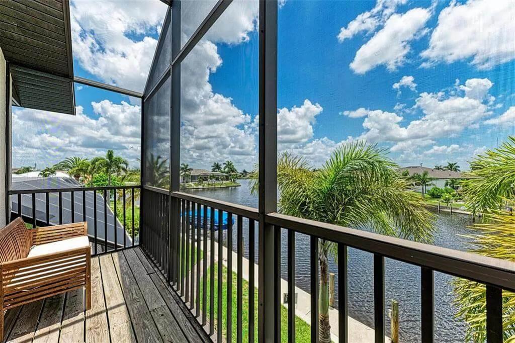 Breezy Balcony with Serene Canal Views and Solar Panel Surprise
