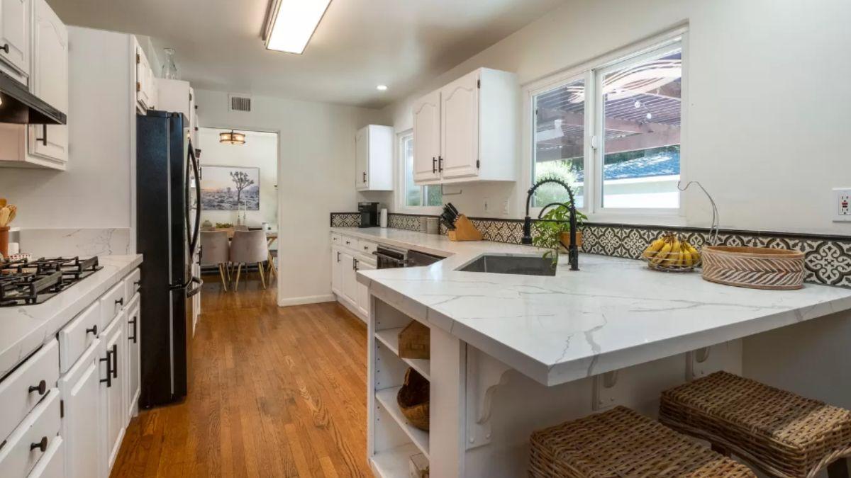 Wow, Check Out This Bright Kitchen with Ornamental Tile Backsplash