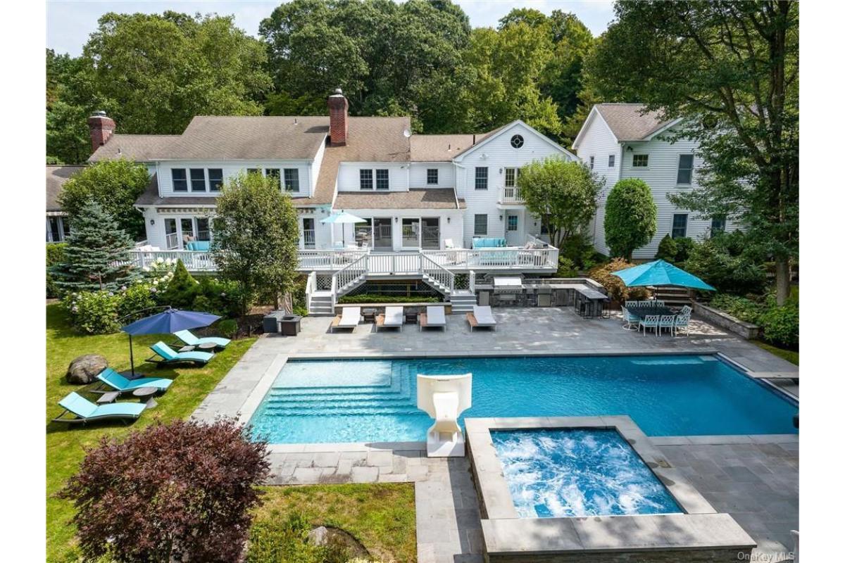 Poolside Fun with a Slide and Spa Combo—What More Could You Want?