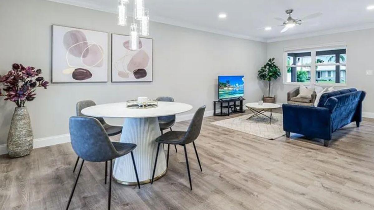 Explore This Open Concept Living Area with Modern Art Accents