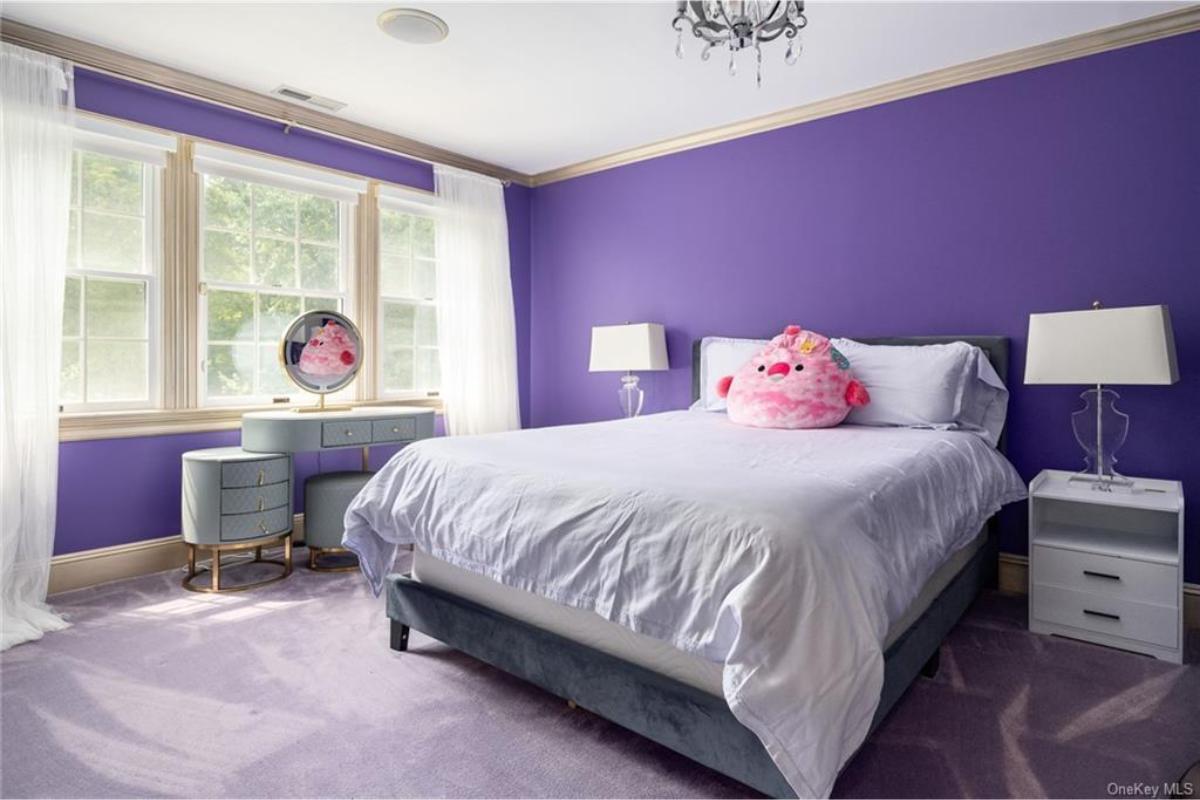Make a Statement with Bold Purple Walls in This Fun Bedroom