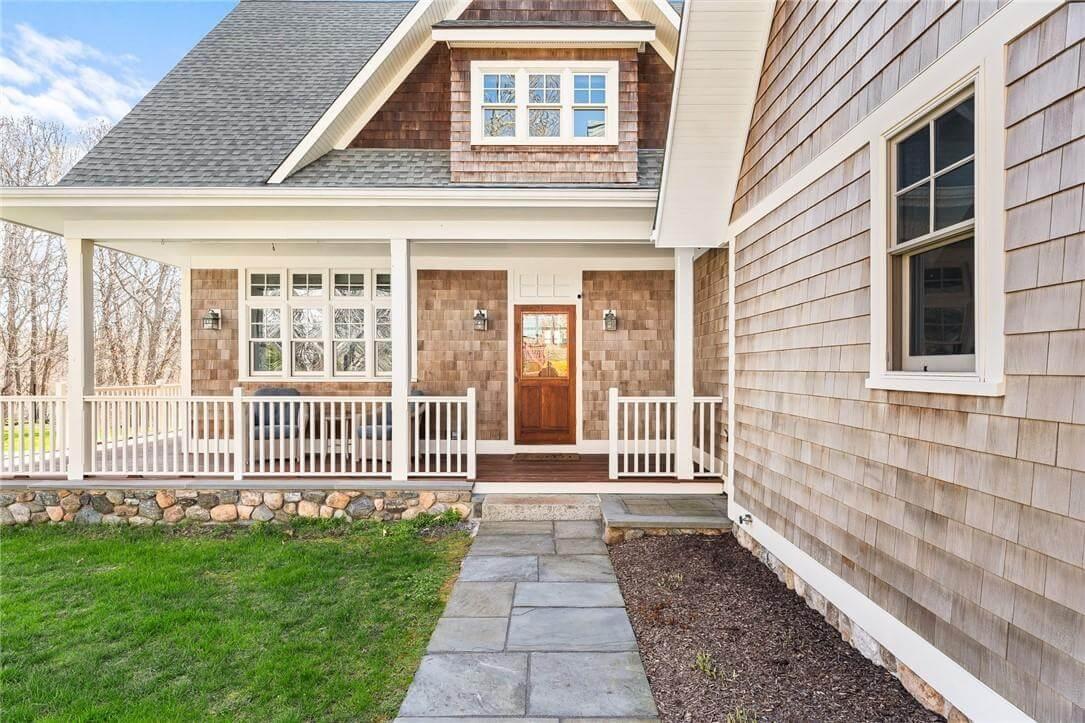 Step onto the Classic Wrap-Around Porch of This Craftsman Gem