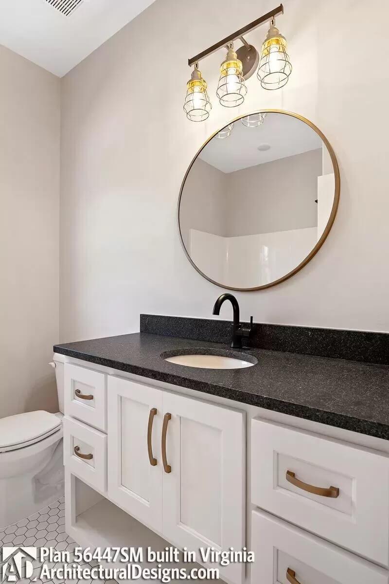 Industrial-Inspired Lighting Elevates This Craftsman Vanity Space