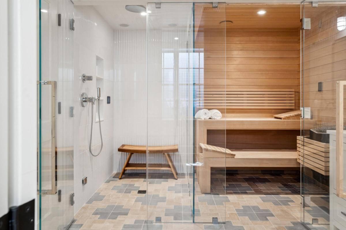 Step Into This Modern Sauna with Sleek Glass Enclosure and Natural Wood Accents