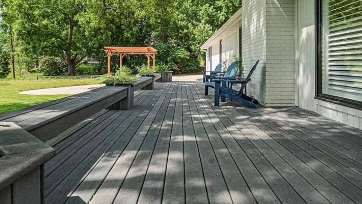 Relax on This Expansive Deck with Built-In Seating
