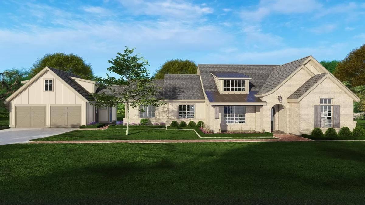Welcoming Facade with Dormer Window and Cozy Brick Pathway