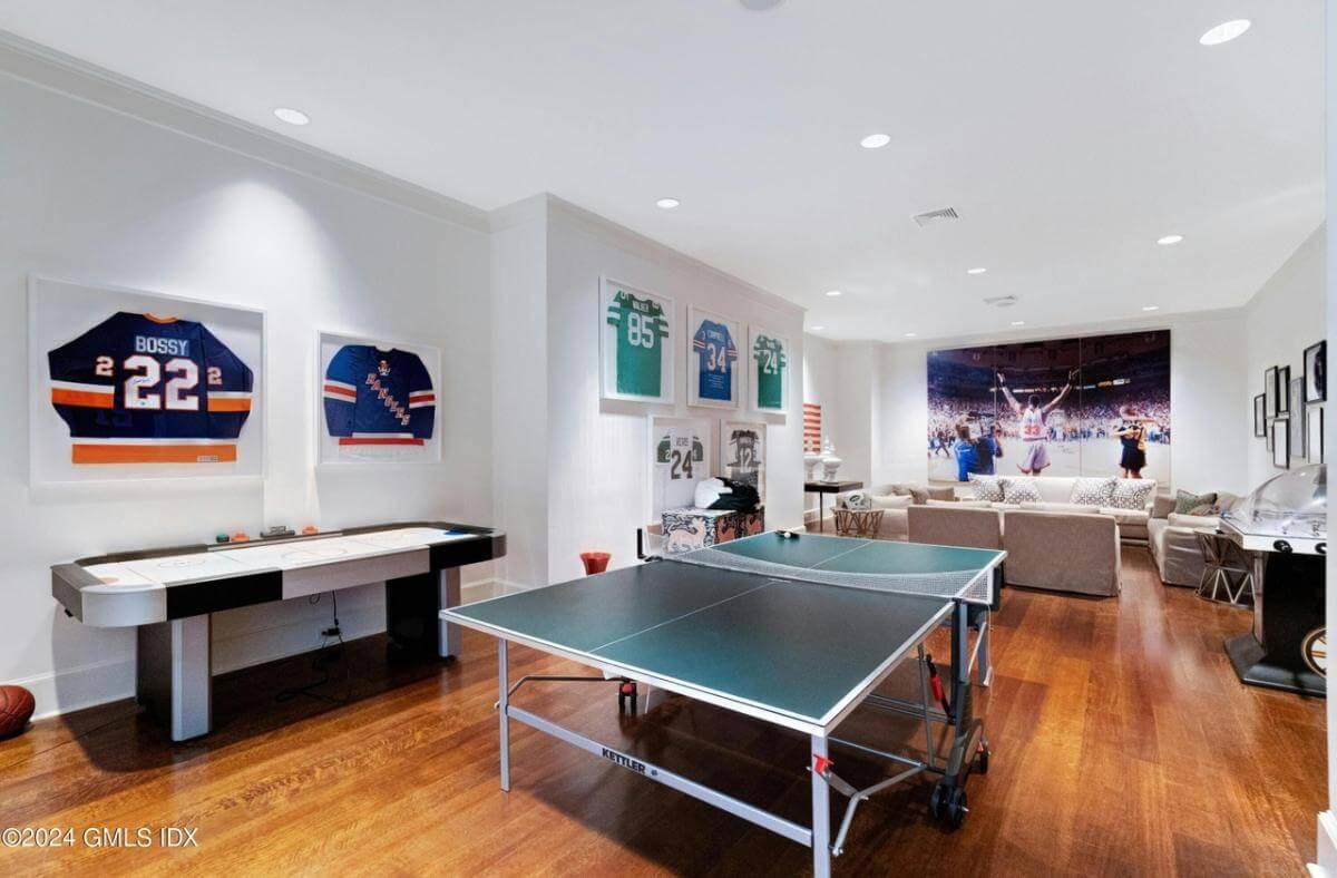 Check Out This Stylish Game Room Full of Sports Memorabilia