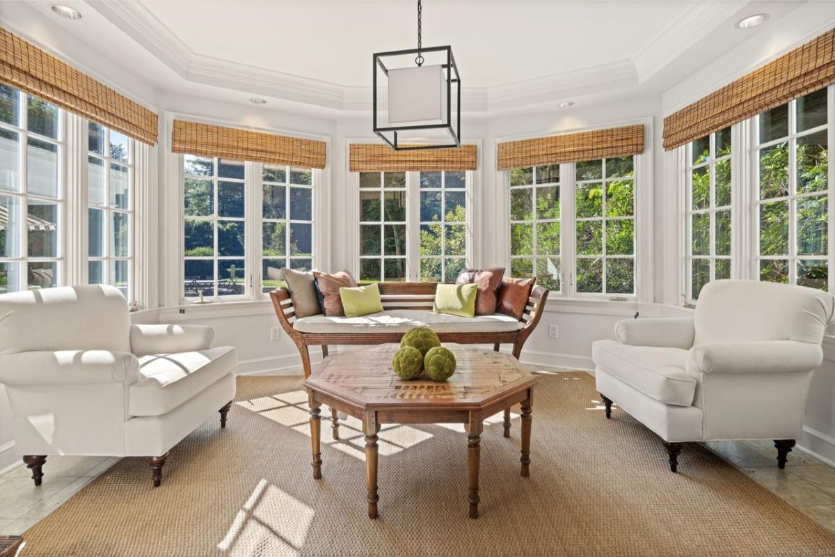 Sunlit Bay Window Nook with Classic Armchairs