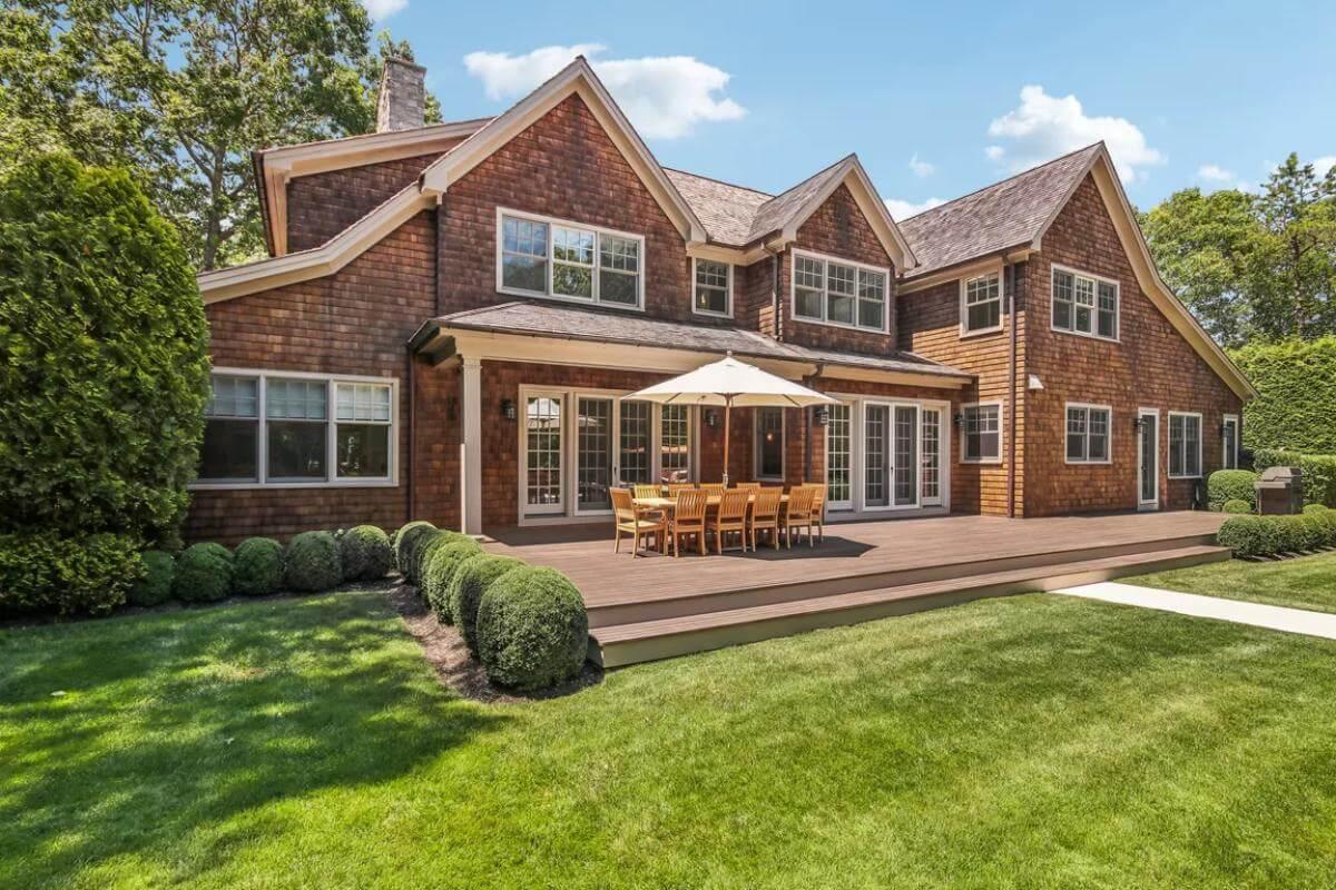 Dive Into the Elegance of This Shingle-Style Retreat with a Spacious Deck