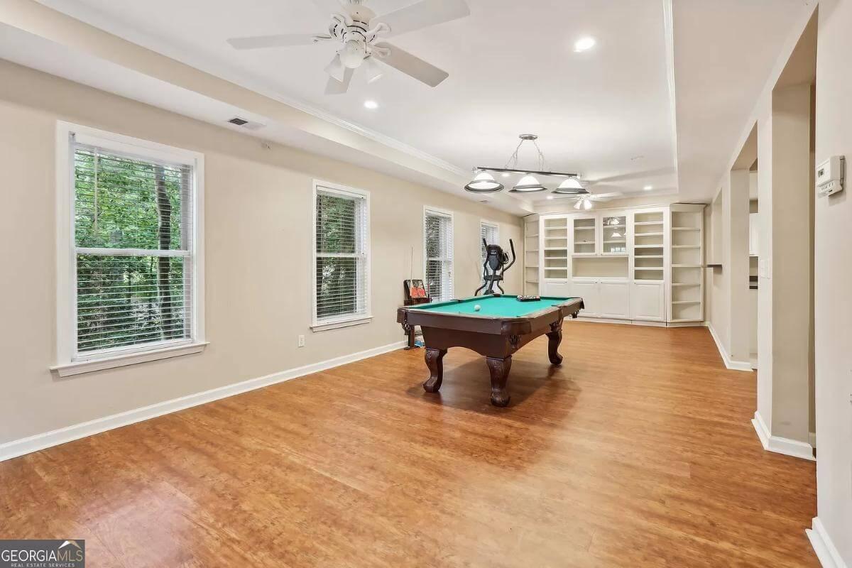 Game Room with Custom Shelving and Scenic Views