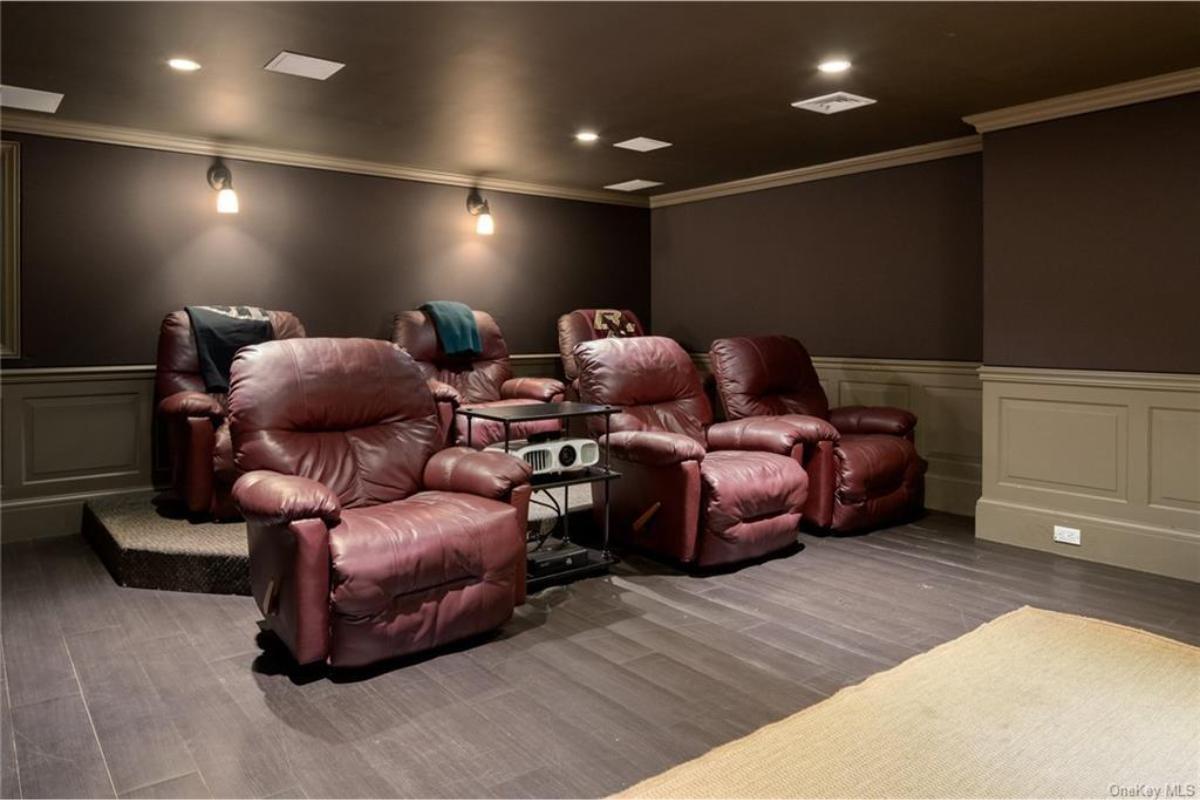 Experience a Cozy Movie Night in This Plush Home Theater