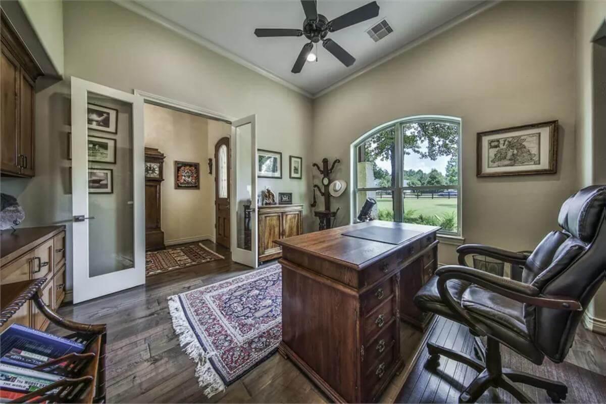 Step into the Sunlit Home Office with Hardwood Details