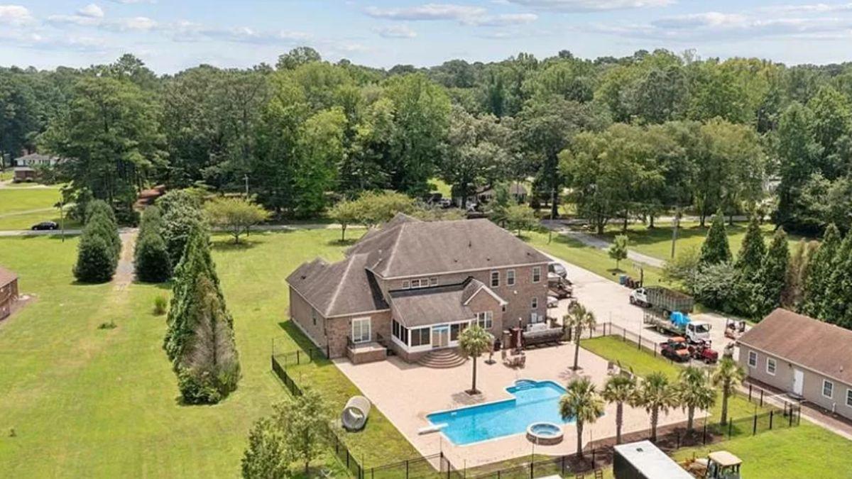 Check Out This Backyard Oasis with Pool and Patio
